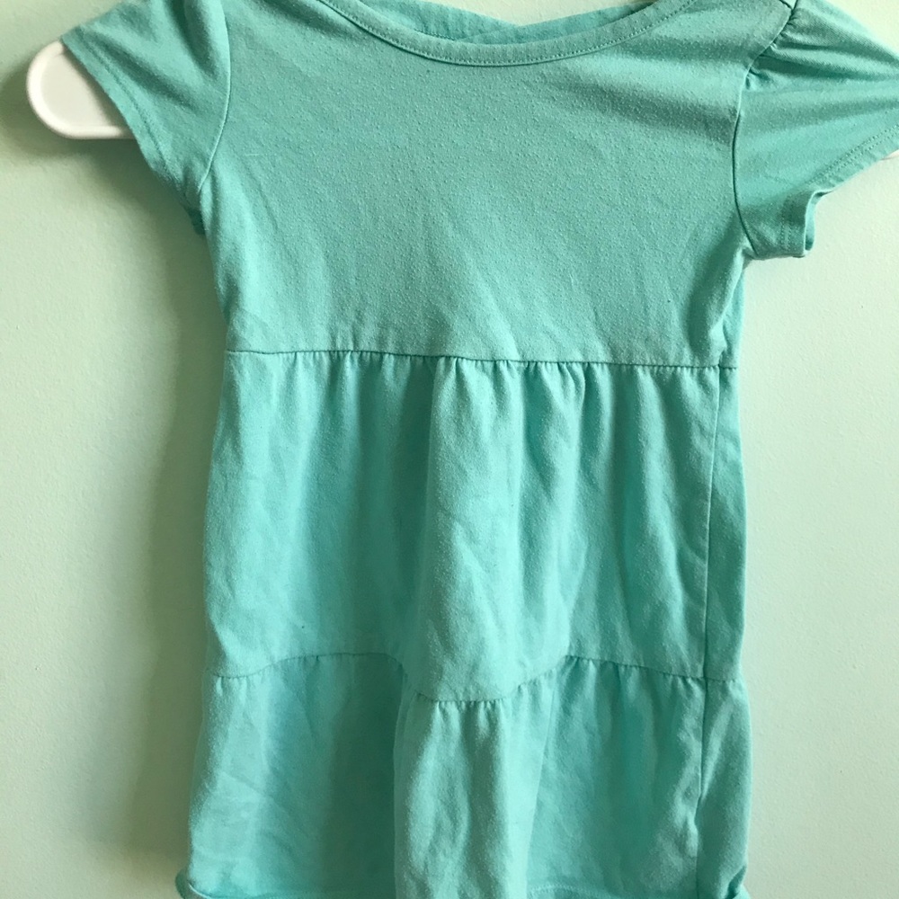 A girls blue flowy dress